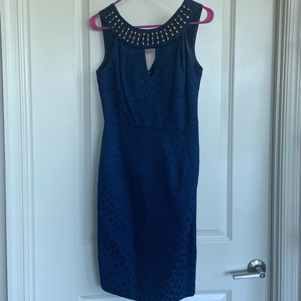 Embelished, fitted navy blue dress with V in back